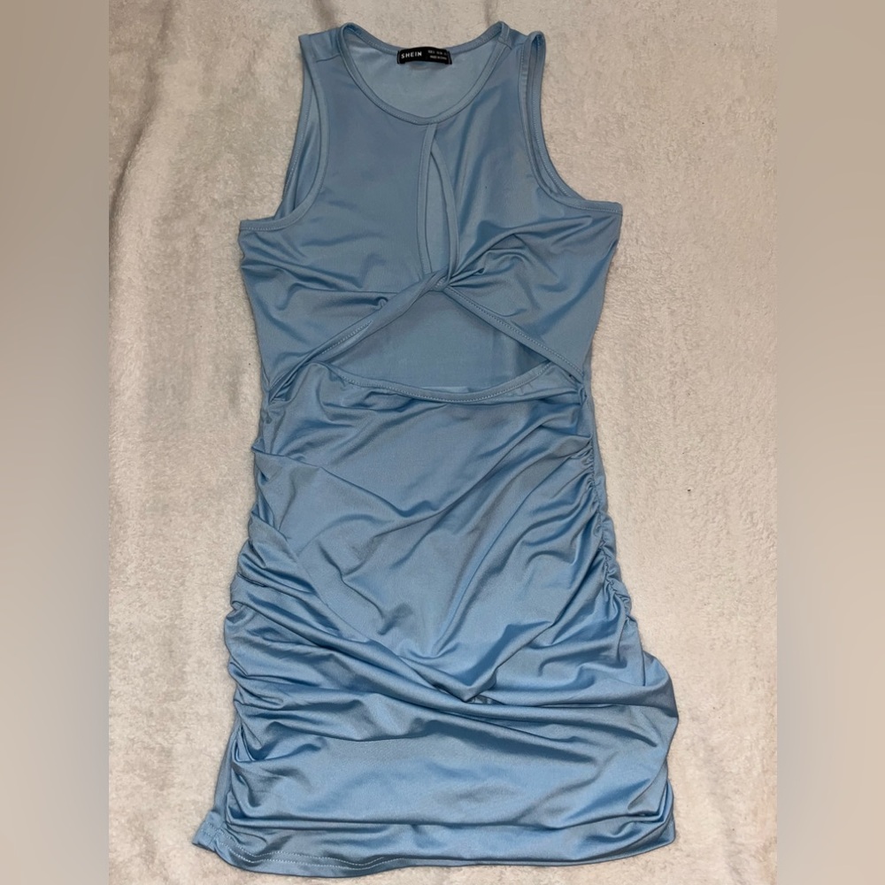 Light blue shein dress. I am wearing it in the last picture